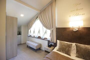 Фото номера Двухместный номер Делюкс с 1 кроватью Гостевой дом Lavender Inn Guest House г. Viešvėnai 7