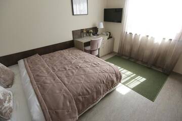 Фото номера Двухместный номер с 1 кроватью, вид на сад Гостевой дом Lavender Inn Guest House г. Viešvėnai 8